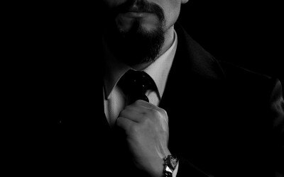 image of white man in dark suit