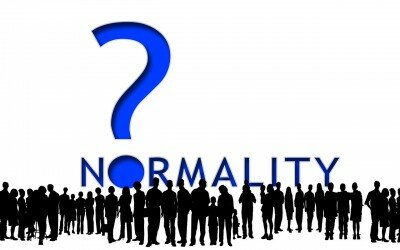 silhouettes of people with the word normality and a question mark
