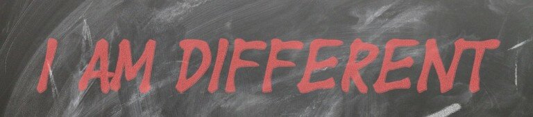 Red text and grey background saying "I Am Different"